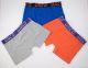 Boxers colores gris, marino y naranja.
